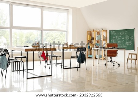 Interior of classroom with desks