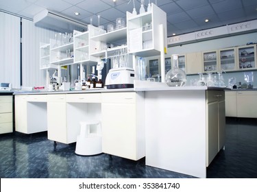 Interior Of Clean Modern White Medical Or Chemical Laboratory Background. Laboratory Concept Without People. Horizontal Template For A Poster, Webpage Or Leaflet.
