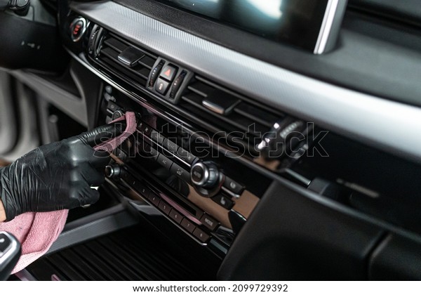 Interior\
cleaning vehicle with brush and\
microfiber