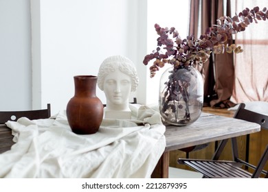 Interior Composition With A Plaster Head On The Table.