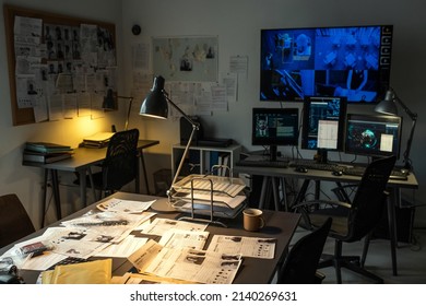 Interior of contemporary federal bureau of investigations with workplace of agents and security camera on computers and large screen - Shutterstock ID 2140269631