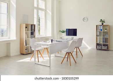 Interior Of Cozy Light Boardroom With Table, Modern Stylish Chairs And Desktop Computer, All Ready For Corporate Meeting. Empty Spacious Office Of Business Company Or Creative Coworking Space