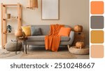 Interior of cozy living room with sofa, shelving unit and autumn decor. Different color patterns