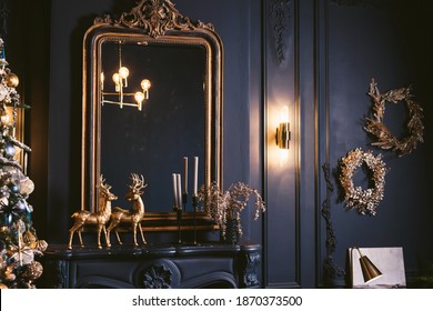 Interior Of Cozy Room Decorated In Christmas Happy New Year Style. Fireplace. No People. An Empty Sofa, Christmas Tree With Presents Under It. Selective Focus. Happy NY Mood