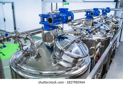 Interior Of Dairy Factory With Fermentation Tank. Technology Equipment At Dairy Farm. Sterile Production.