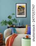 Interior desgin of modern living room interior with mock up poster frame, colorful decorations and accessories, plants, sofa, coffee table. Blue wall. Home decor. Template	
