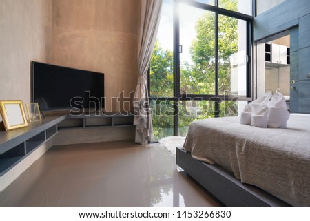 Interior design in bedroom with television