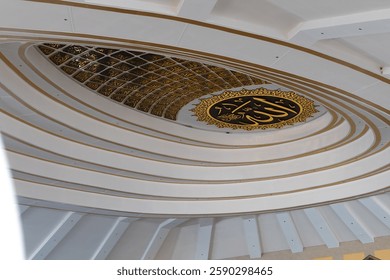 Interior design of the ceiling in the mosque with calligraphy of the name of Allah (Asmaul Husna)