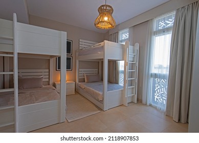 Interior Design Decor Furnishing Of Luxury Show Home Childrens Bedroom Showing Furniture And Bunk Beds In Resort