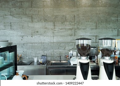 Interior design and decoration of coffee cafe and bakery shop -decorated with white furniture and concrete cement block