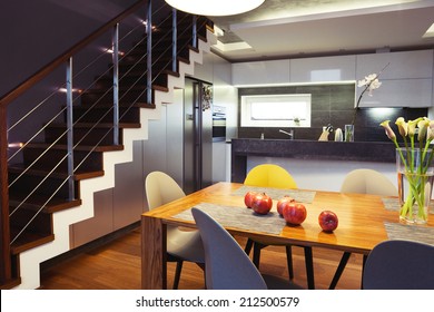 Interior design - dining table and chairs in a kitchen 