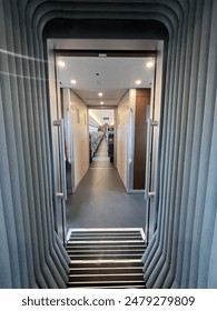 Interior design in fast train connection between trains has modern technology with automatic doors for each train for each class in fast train jakarta bandung indonesia