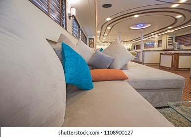 Interior design furnishing decor of the salon area in a large luxury motor yacht