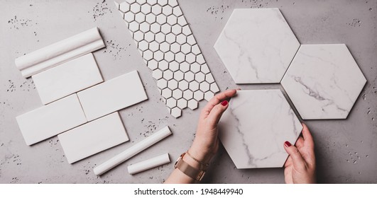 Interior design and home decoration - different shapes of white ceramic and gres tiles. Designer choosing bathroom or kitchen renovation materials. Captured from above (top view, flat lay). - Shutterstock ID 1948449940