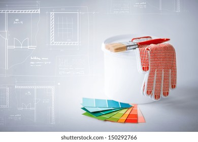 Interior Design And Home Renovation Concept - Paintbrush, Paint Pot, Gloves, Pantone Samplers And Blueprint