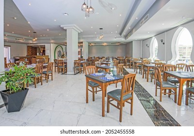 Interior Design Of A Luxury Hotel Restaurant Dining Area With Table Settings