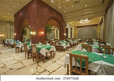 Interior Design Of A Luxury Hotel Restaurant Dining Area With Ornate Decor