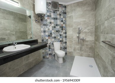 Interior Design Of A Luxury Show Home Bathroom With Disabled Access Shower Wet Room And Sink