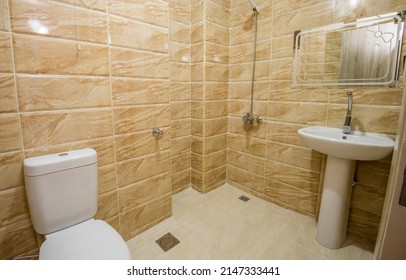 Interior Design Of A Luxury Show Home Bathroom With Wet Room Shower And Sink