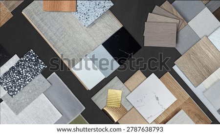 Interior design material samples board flat lay with wood veneer swatches, marble tile textures, granite stone countertop chips, terrazzo fabric and laminate flooring palette for moodboard layout.