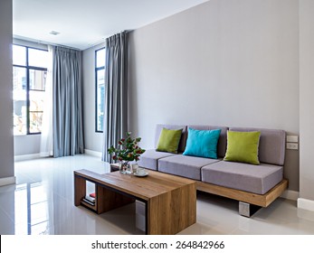 Interior design of minimalist modern Living room with sofa - Powered by Shutterstock