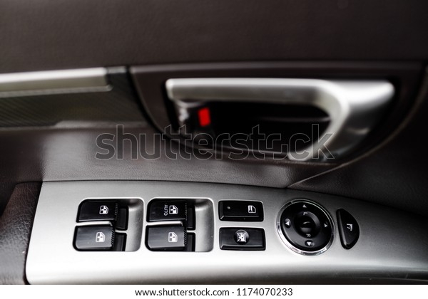 Interior design of the modern\
car. Modern luxury prestige car interior, dashboard, steering\
wheel.