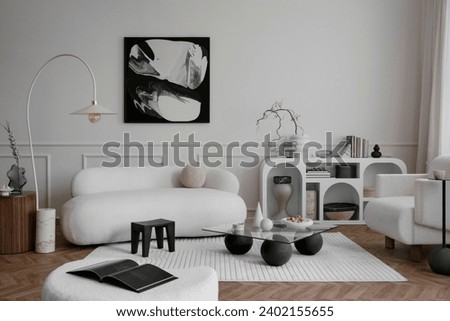 Interior design of modern living room interior with mock up poster frame, stylish sofa, glass coffee table, stylish lamp, white armchair, modern sideboard and personal accessories. Home decor Template