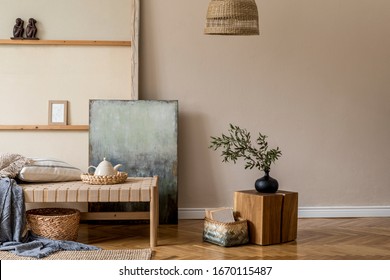 Interior design of oriental style living room with modern chaise longue, wooden cube, pillow plaid, rattan decoration, tea pot and elegant personal accessories in stylish home decor. 