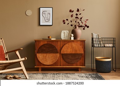Interior design of unique living room with stylish commode, armchair, dired flowers in vase, mock up poster on the wall, carpet, decoration and personal accessories in modern home decor. Template.