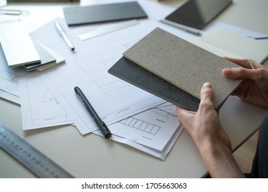 The Interior Designer Selects Ceramic Stoneware And Marble Samples. Designer At Work. Interior Design. Architecture. Decoration. Design Project Blueprints. Grey Marble. Grey Stone. Decorative Material