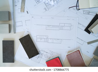 Interior Designer Selects Ceramic Stoneware And Marble Samples. Designer At Work. Architecture. Decoration. Design Project Blueprints. Plans And Driwings. Grey Stone. Decorative Material. Flatlay.