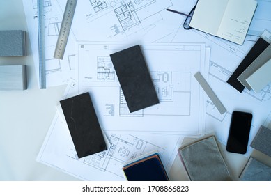 Interior Designer Selects Ceramic Stoneware And Marble Samples. Designer At Work. Architecture. Decoration. Design Project Blueprints. Plans And Driwings. Grey Stone. Decorative Material. Flatlay.