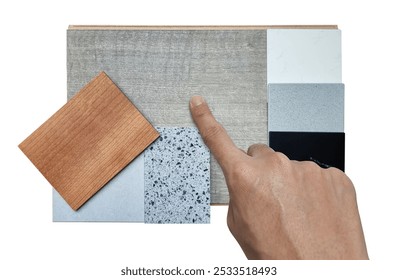 interior designer selects material samples in top view contains engineering wooden flooring tile, palette of artificial stones, terrazzo, oak wooden veneer isolated on background with clipping path.  - Powered by Shutterstock