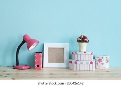 Interior Detail. Home Shelf With Shabby Chic Decor On It Over Blue Wall