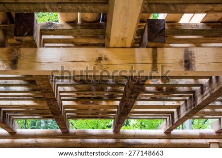 Interior detail of a wooden beam structure
