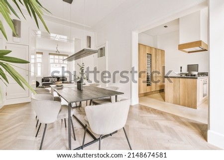 Interior of the dining area with modern furniture in a cozy house ストックフォト © 