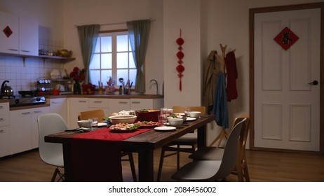 Interior Of A Dining Room With Reunion Dinner And Festive Decoration In Celebration Of Chinese New Year At Home. Chinese Character On Door Translation: Spring