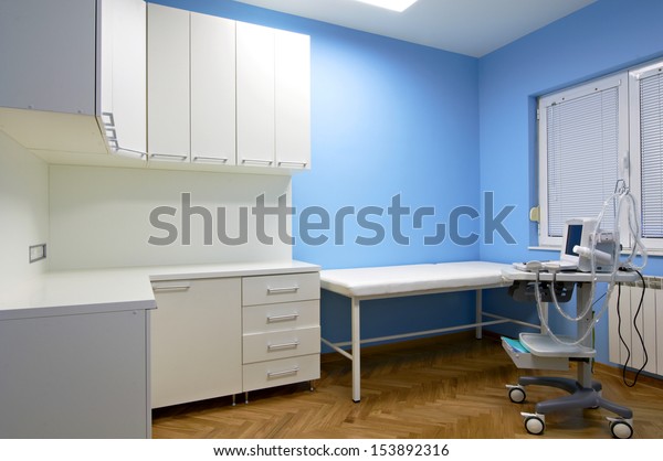 Interior of a doctor\'s consulting room with\
Medical ultrasound diagnostic\
equipment
