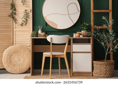 Interior of dressing room with makeup table, plants and wooden folding screen