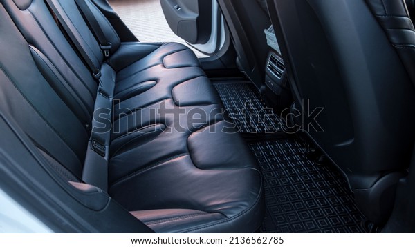 Interior of an electric car from the inside,\
trunk, seats and\
controls