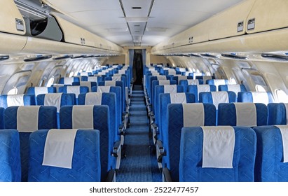 Interior of empty blue aircraft seats. Horizontally. 