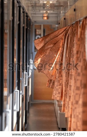the interior of the empty corridor of the occasional train 