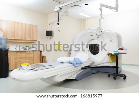 Interior of empty CT scan room in hospital