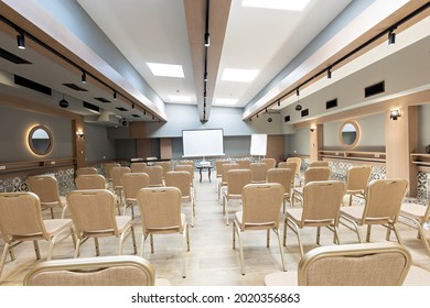 Interior Of A Empty Hotel Seminar Room With Chairs In A Row