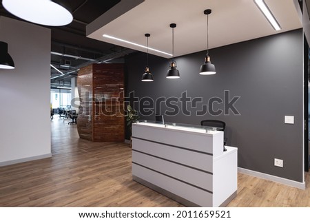 Interior of empty lobby with reception counter in modern office. modern office of a creative design business.