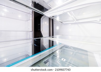 Interior Of Empty Modern French Door Fridge Refrigerator With Camera Point Of View From Inside Pov With Clean Shelf Shelves Closeup