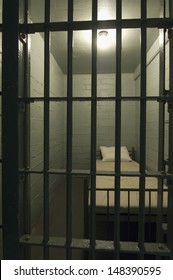 Interior of empty prison cell