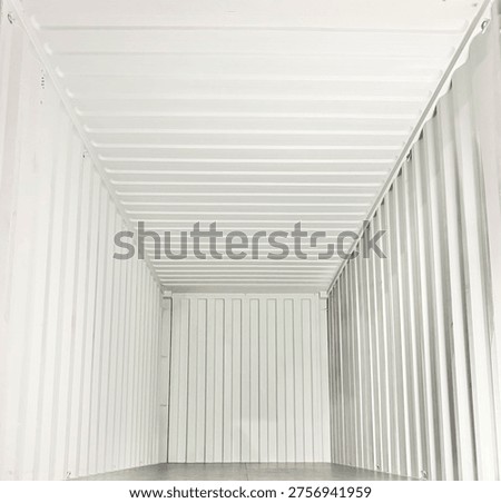 interior of empty white shipping container with clean metal walls and floor, ready for cargo loading. Industrial logistics, transportation and export concept