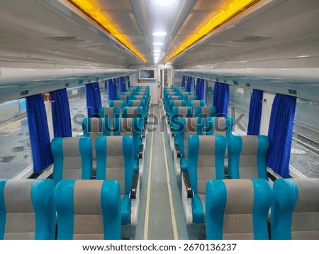  the interior of an Executive Class train car in Indonesia