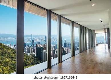 Interior Of Expansive And Spacious Modern Residential Condominium Unit Or Apartment Flat On Victoria Peak With Views Of Hong Kong And Kowloon Skyline And Victoria Harbour. Expensive Real Estate.